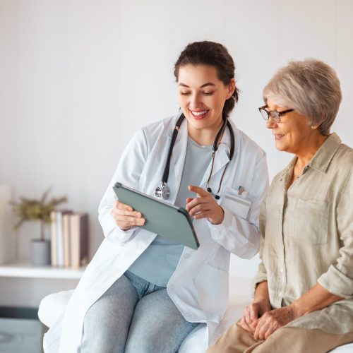 Female,Patient,Listening,To,A,Doctor,In,Hospital.
